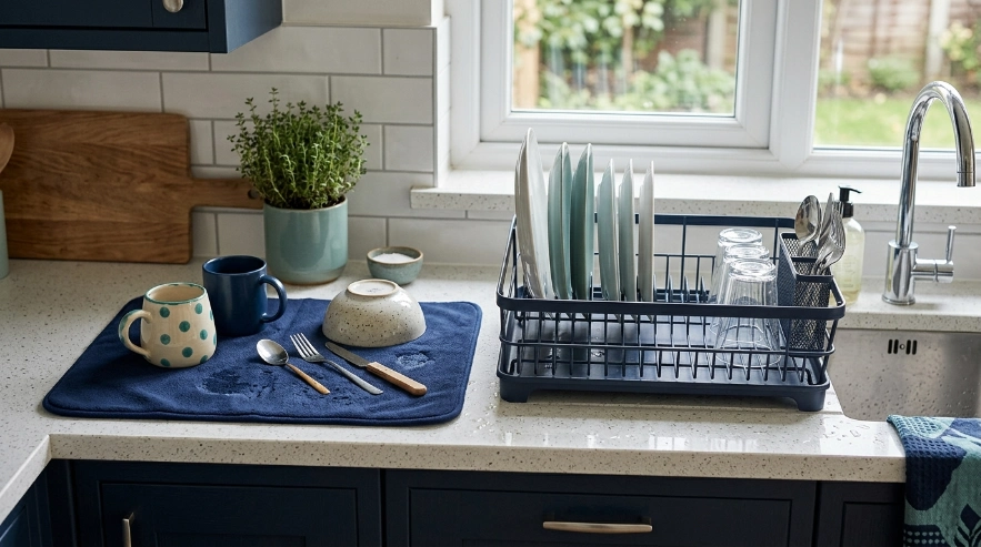 Drying mat beside a dish rack showing differences in storage and dish organization
